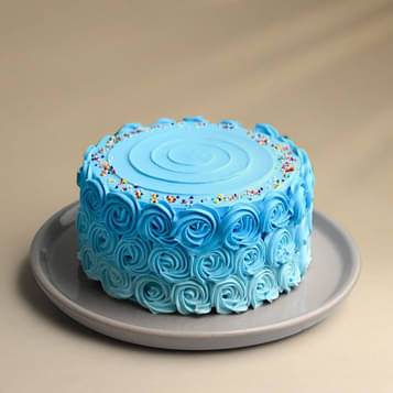 Blue Sprinkles Frosted Cake