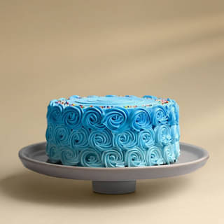Front View of Blue Sprinkles Frosted Cake