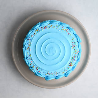 Blue Sprinkles Frosted Cake