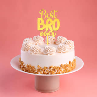 Side View of Best Bro Butterscotch Cake With Topper