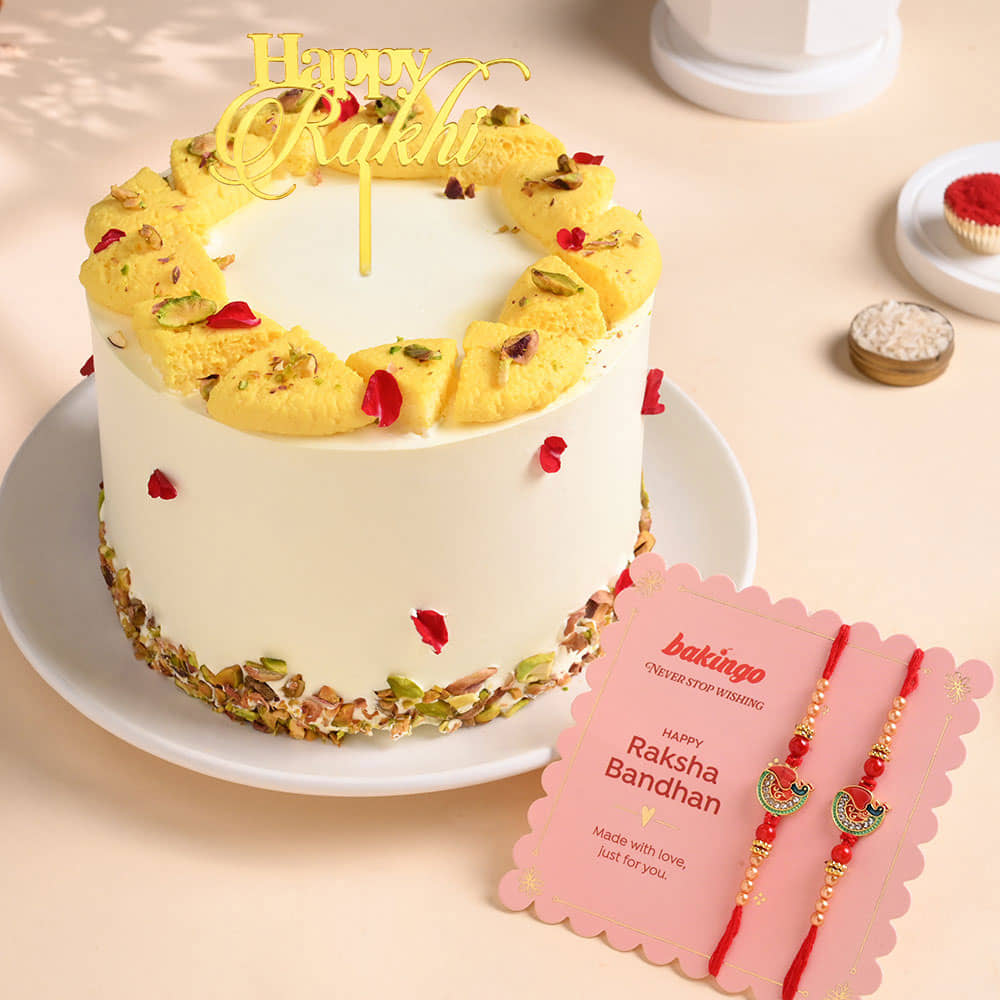 Rasmalai Cake With Two Peacock Designer Rakhis Rasmalai Cake With Rakhi