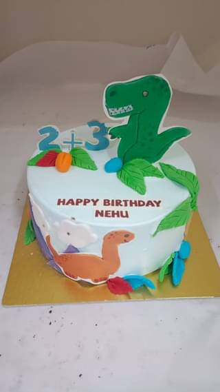 Round Dino Park Theme Cake