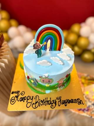 Playful Cocomelon Theme Crea m Cake