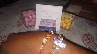 Dragee Trio With Vibrant Rakhi