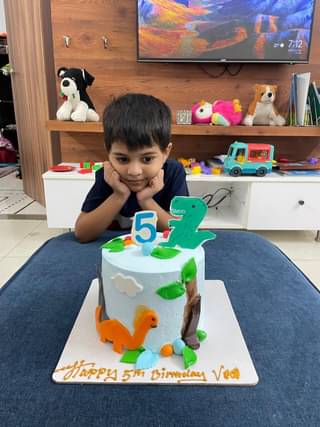 Round Dino Park Theme Cream Cake