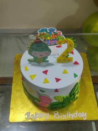 Dino Cream N Sugar Sheet Cake