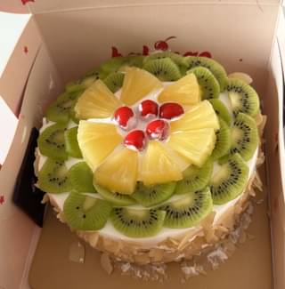 Fresh Fruits Topped Almonds Cake