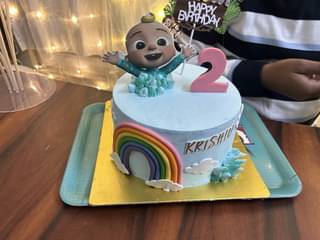 Cheerful Cocomelon Rainbow Fondant Cake