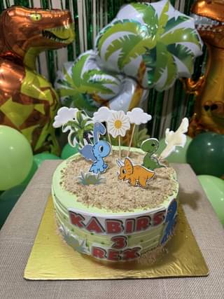 Vibrant Dinosaur Theme Cake