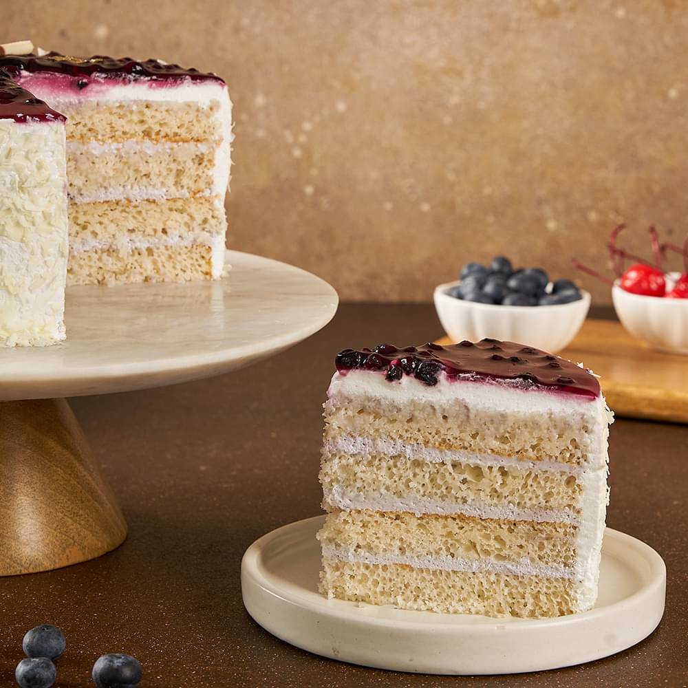 Sliced View of Blueberry Vanilla Cake with ingredients