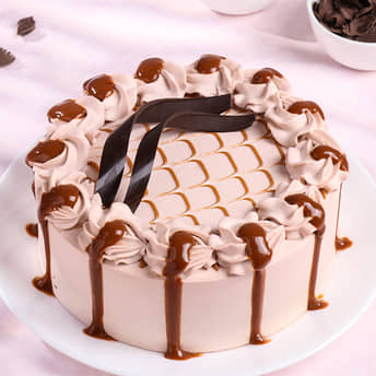 Dripping Caramel Cake