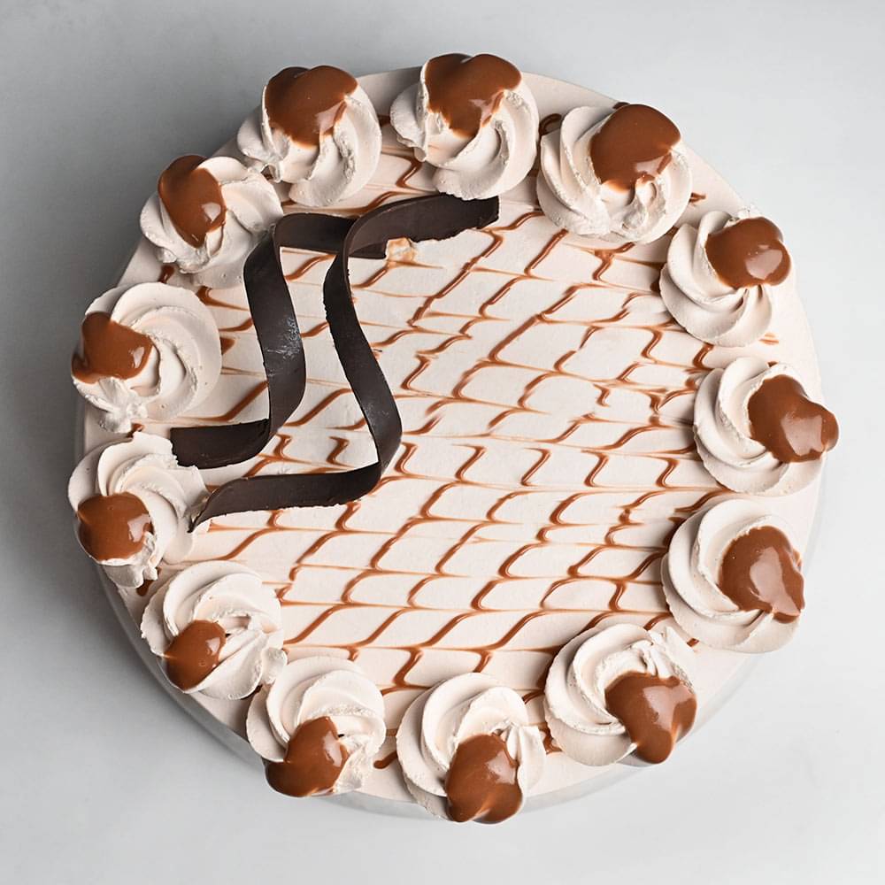 Dripping Caramel Cake