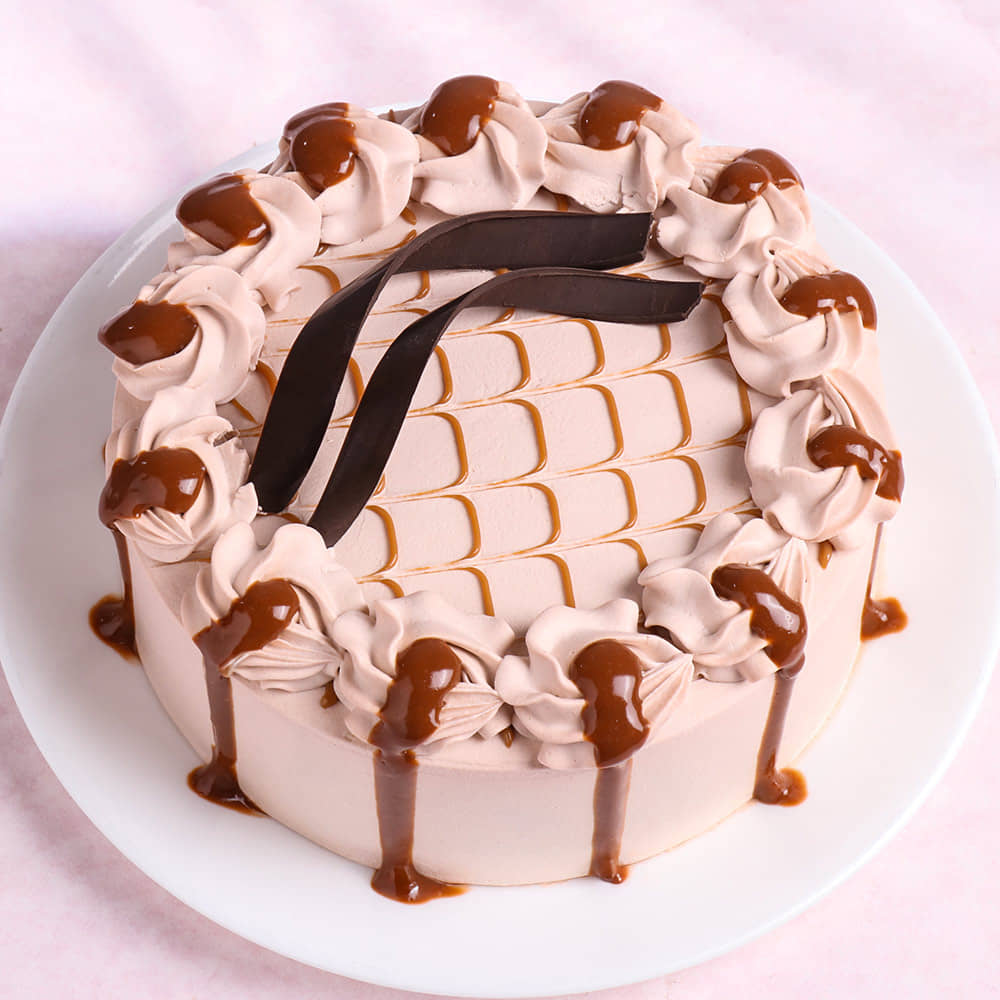 Dripping Caramel Cake