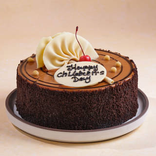 Side View of Childrens Day Butterscotch Cake Side View of Childrens Day Butterscotch Cake