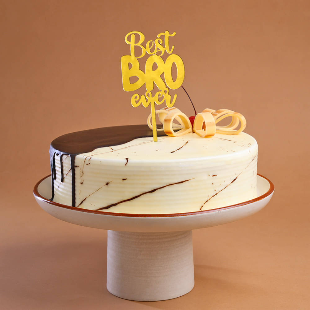 Side View of Choco Vanilla Brother Cake And Evil Eye Rakhi