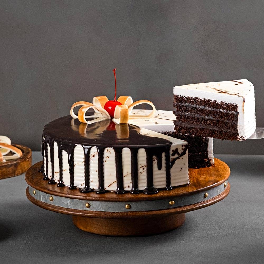 Sliced View of Chocolate & Vanilla Drip Cake