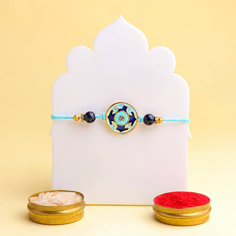 Order Chocolate Ferrero Rocher Cake With Floral Rakhi Online