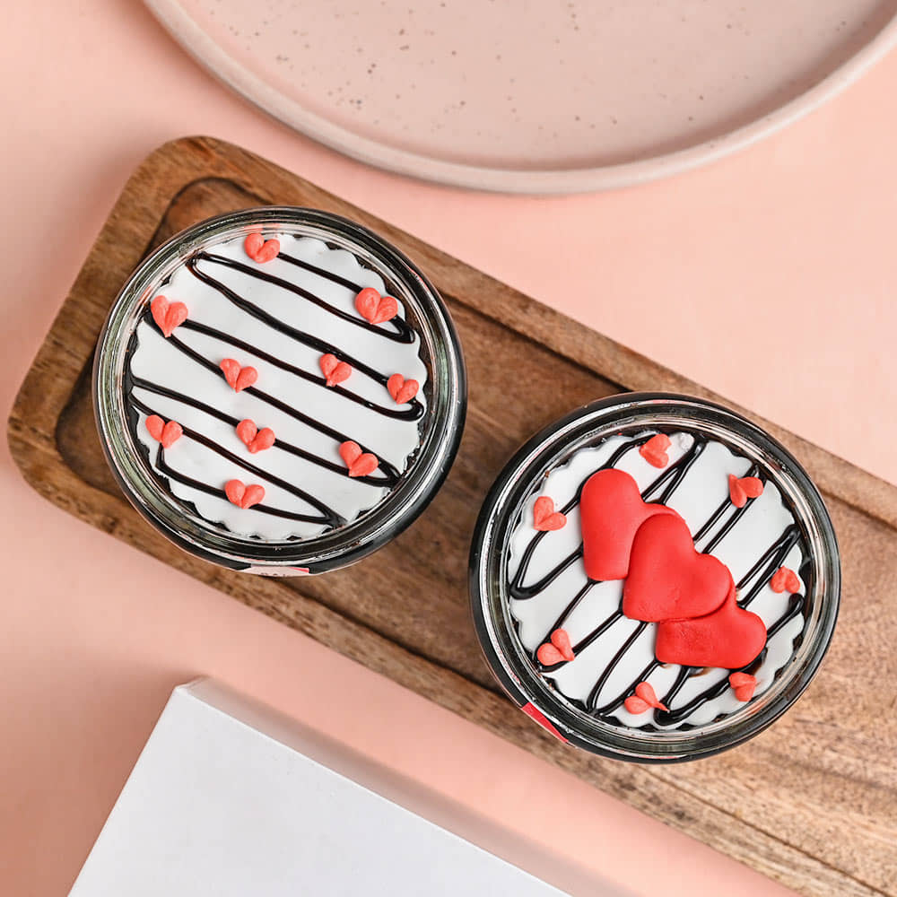 Top View of Chocolate Jar Cake And Tasty Hearts Online