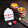 Vibrant Rakhis With Red Velvet Jar Cakes