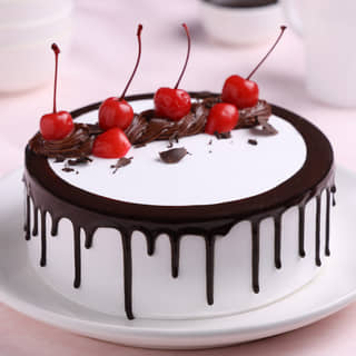 Front View of Chocolate N Cherries Black Forest Drip Cake Front View of Chocolate N Cherries Black Forest Drip Cake