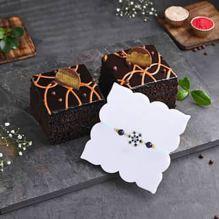 Chocolate Truffle Pastries With Floral Charm Rakhi Chocolate Truffle Pastries With Floral Charm Rakhi