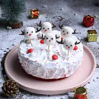 Christmas Miniatures On Red Velvet Cake
