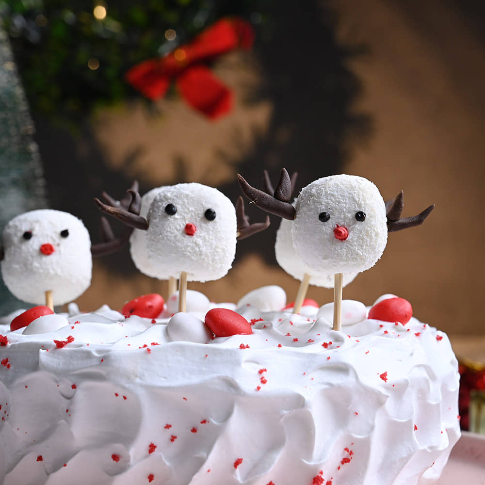 Christmas Miniatures On Red Velvet Cake