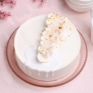 Front View of Classic Vanilla Minimalist Cake Front View of Classic Vanilla Minimalist Cake