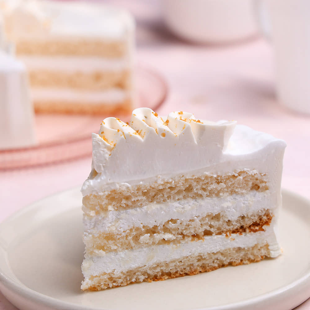 Classic Vanilla Minimalist Cake Sliced View of Classic Vanilla Minimalist Cake