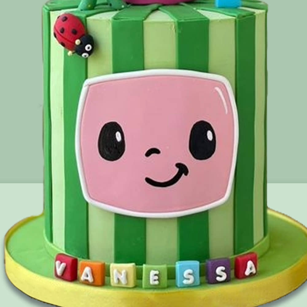 Side View of Colorful Cocomelon Fondant Cake