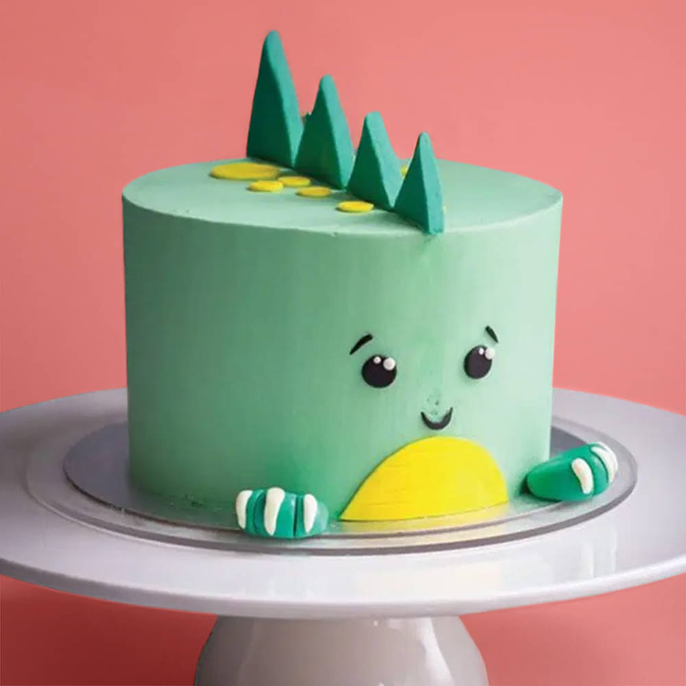 Side Zoomed View of Cute Dinosaur Themed Cake