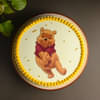 Top View of Cute Pooh Cake N Rakhi