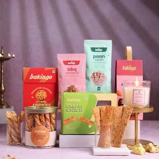 Diwali-Themed Snack Collection with Candle and Oil Lamp