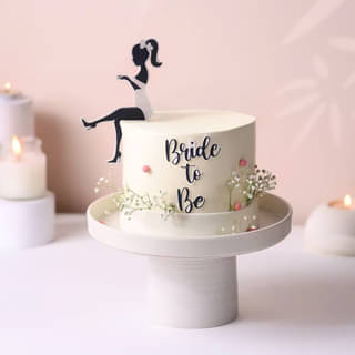 Side View of Romantic Floral-Themed Bride to Be Cake