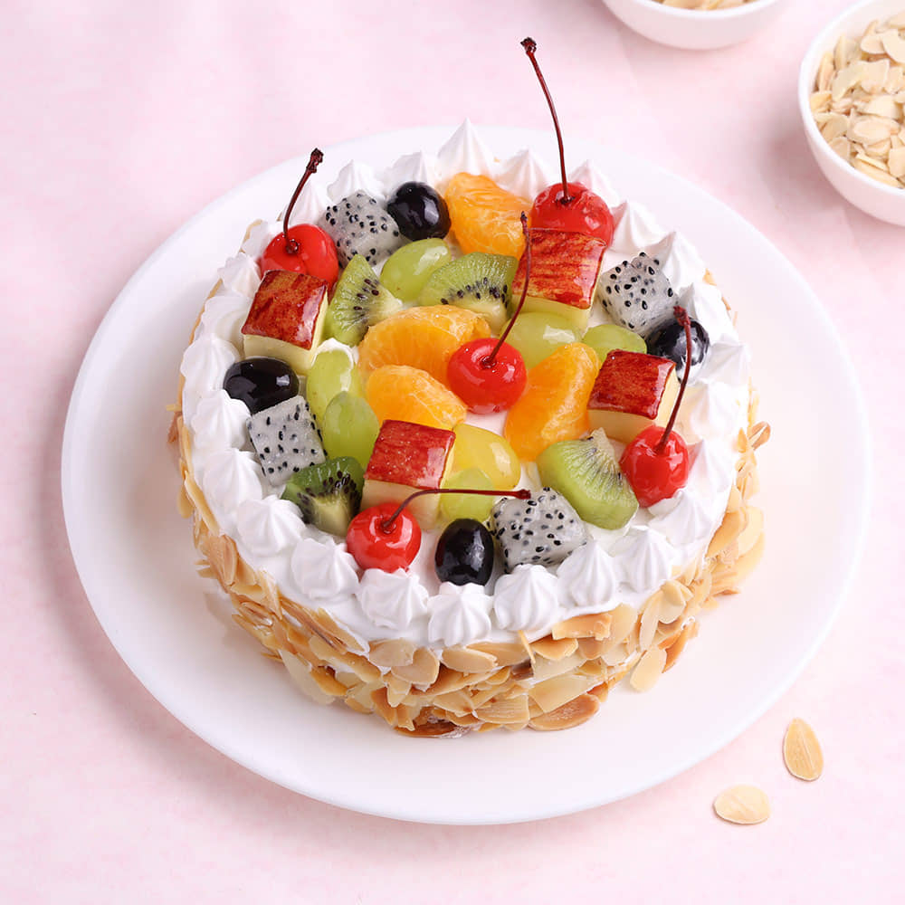Top View of Fresh Fruits & Roasted Almonds Cake