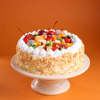 Front View of Fresh Fruits & Roasted Almonds Cake