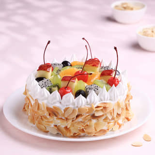 Front View of Fresh Fruits & Roasted Almonds Cake