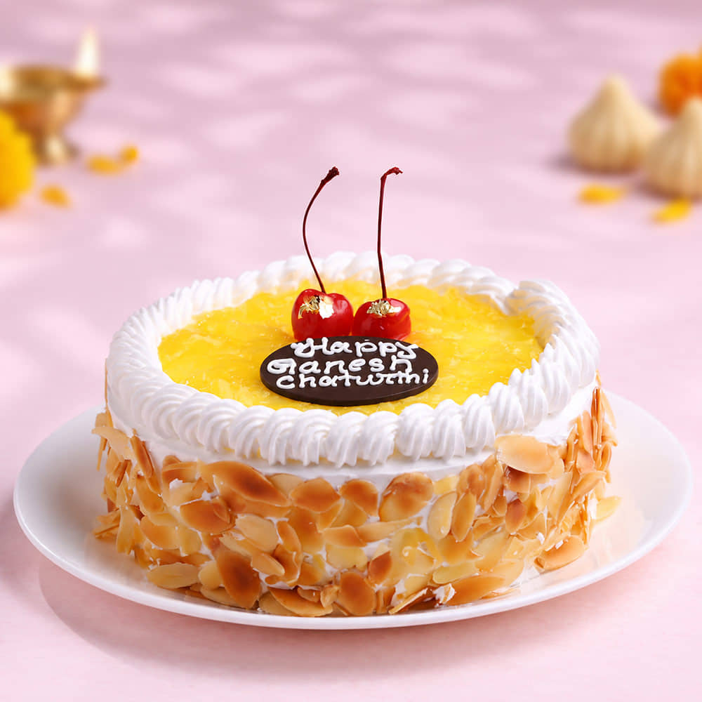 top view of side view of Ganpati Bappa Pineapple Cake top view of side view of Ganpati Bappa Pineapple Cake