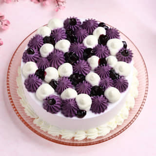 Top View of Glaze Drop Blueberry Cake