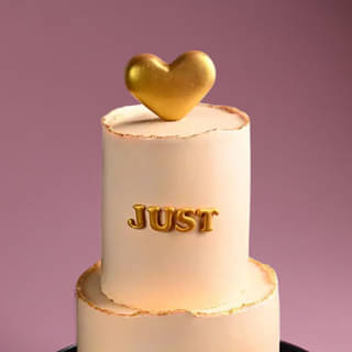 Zoomed-In View of Golden Engagement Celebration Cake