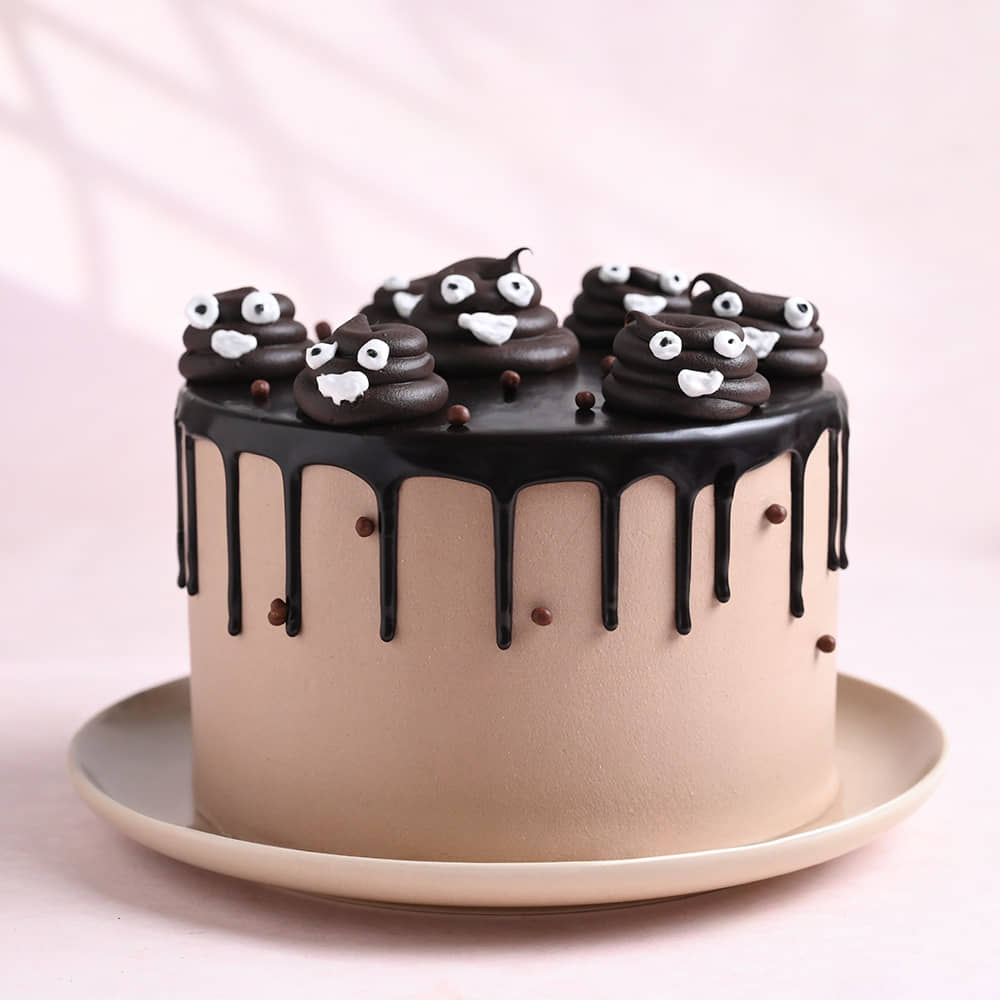 Goofy Poop Faces Cake