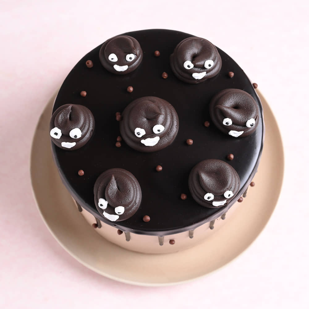 Goofy Poop Faces Cake