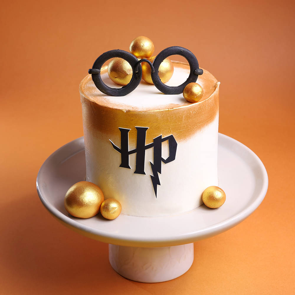 Harry Potter Cake with Glasses and Gold Balls