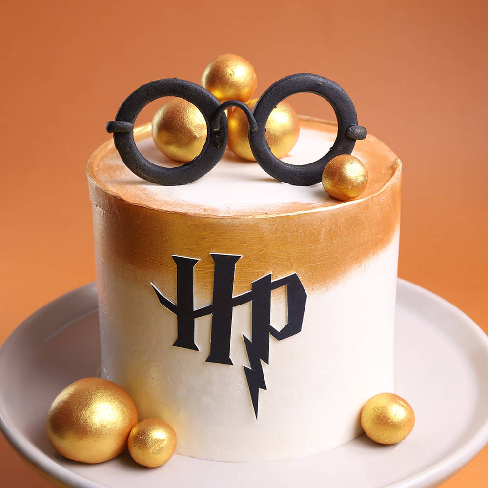 White and Gold HP cake with Wizard Glasses