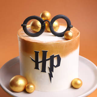 White and Gold HP cake with Wizard Glasses
