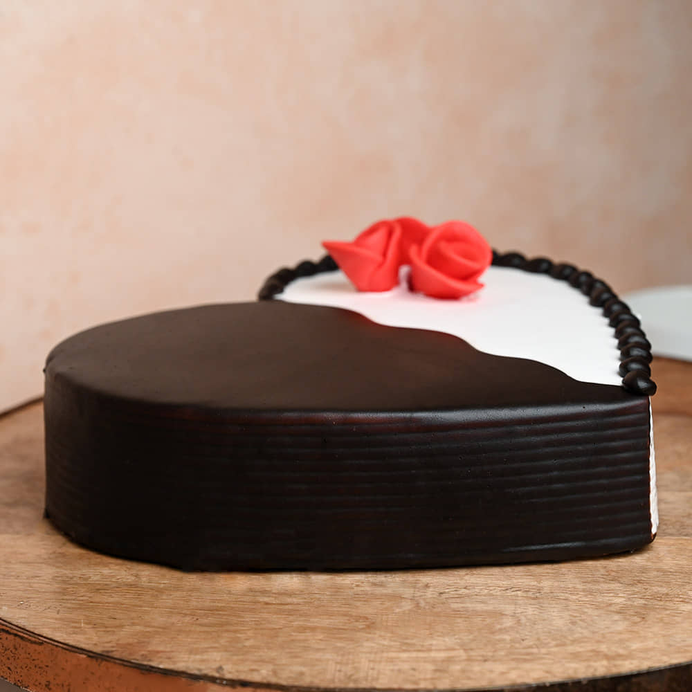 Heart Shape Choco Vanilla Truffle Cake Side View of Heart-Shaped Choco Vanilla Cake