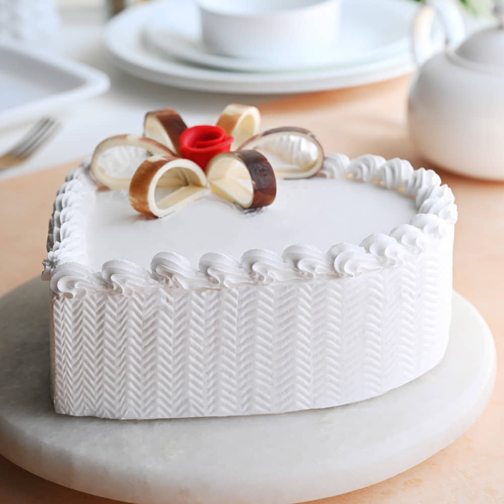 Side View of Floral Fun - A Heart Shaped Vanilla Cake