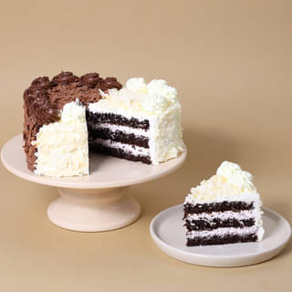 Sliced View of Hearty Black N White Forest Cake