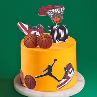 Basketball Cake Decorated with Seakers and a dunking silhouette