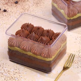 Kunafa Chocolate Tub with layered chocolate dessert and cream topping